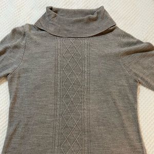Gray cableknit sweater.